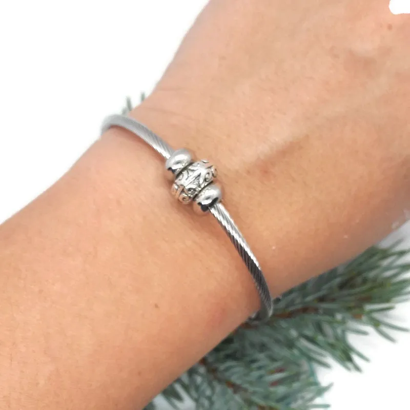 Elegant Elastic Cable Bangle Twisted Stainless Steel Bracelet. Easy to put on adjustable stretch memory wire. One size fits most